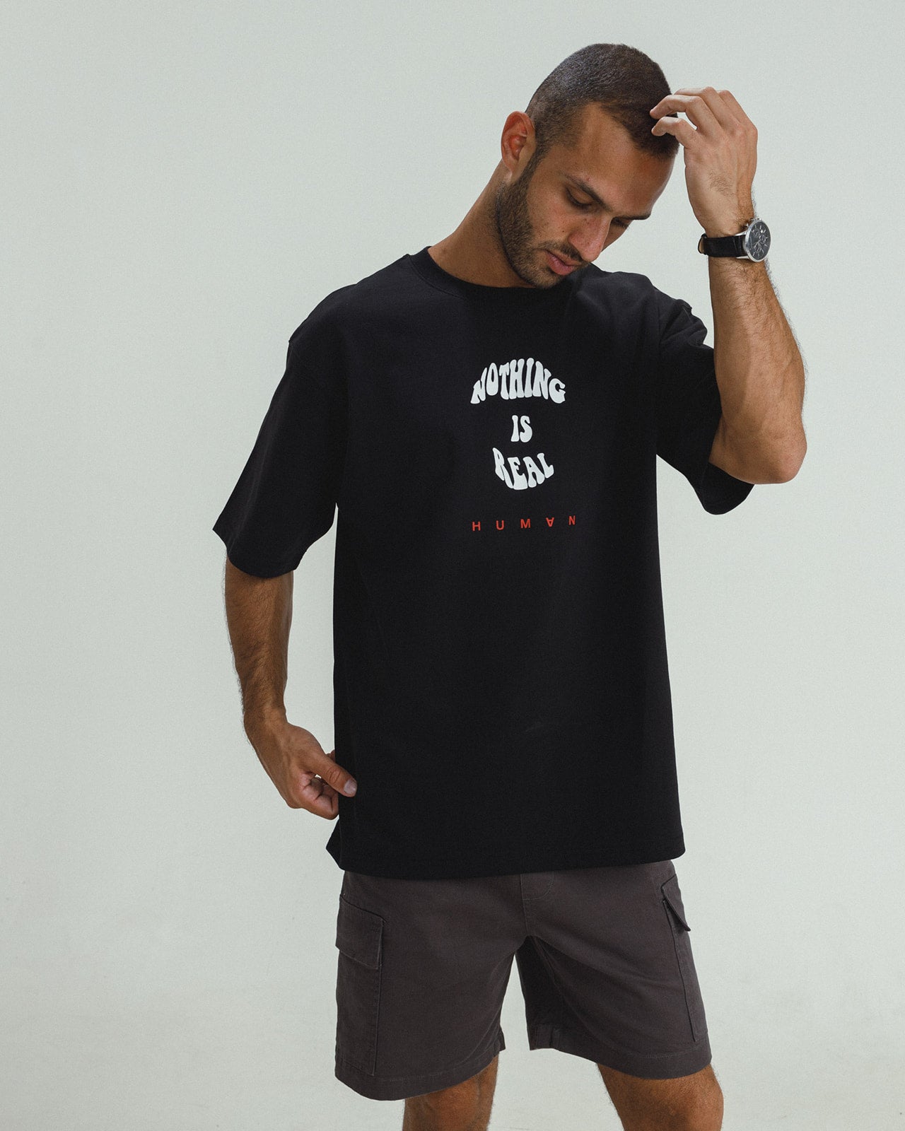 NOTHING IS REAL BLACK OVERSIZED T-SHIRT